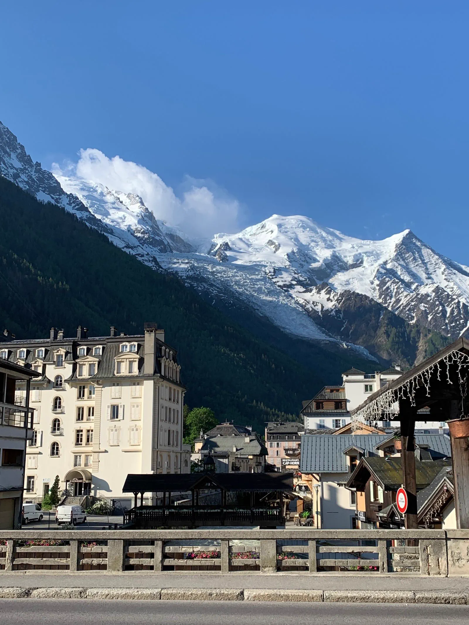 Chamonix town below the snow-capped peaks of the Mont Blanc massif.
